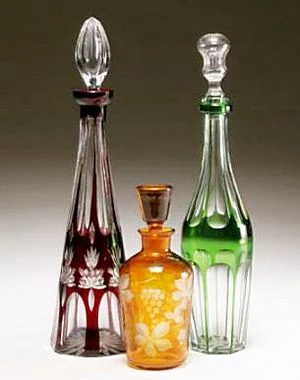 Bohemian cut-to-clear glass decanters with geometric decoration